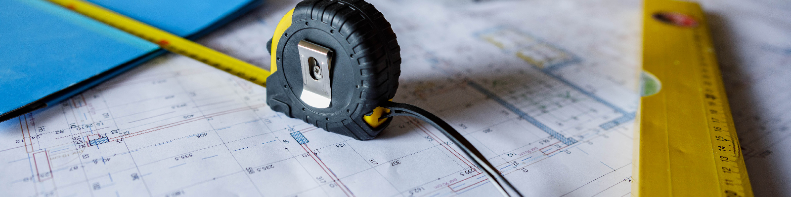 blueprints and measuring tools
